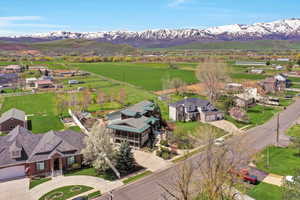 Drone / aerial view with a residential view and a mountain view