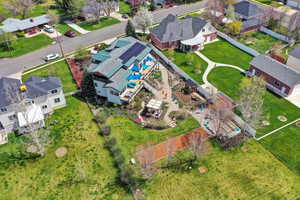 Birds eye view of property with a residential view