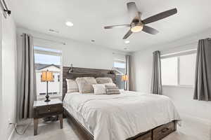 Carpeted bedroom featuring a ceiling fan, recessed lighting, visible vents, and baseboards