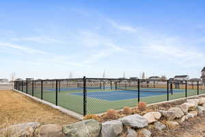 View of pickleball court with fence