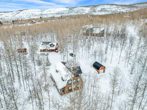 Snowy aerial view with a mountain view