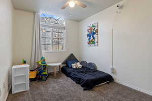 Bedroom with carpet and ceiling fan, east facing tons of natural light