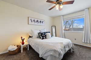 Carpeted primary bedroom with en suite