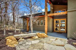 Property entrance featuring a patio area and french doors