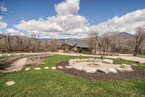 View of yard with a mountain view