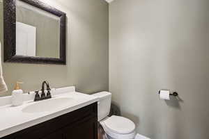 Bathroom featuring toilet and vanity