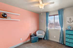 Bedroom featuring ceiling fan, visible vents, baseboards, and carpet flooring