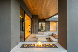 Balcony featuring a fire pit