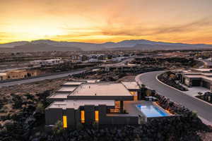 Aerial view at dusk with a mountain view