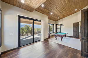 Game room with wooden ceiling, baseboards, dark wood finished floors, and recessed lighting