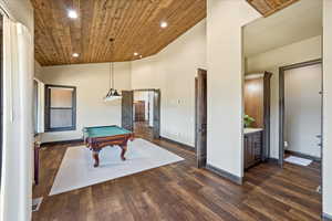 Recreation room with recessed lighting, dark wood-style flooring, billiards, wood ceiling, and baseboards