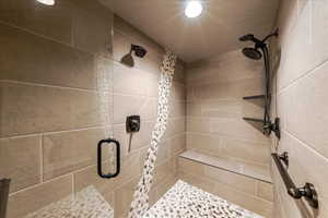 Bathroom featuring a shower stall