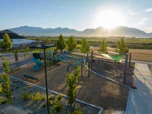 Community jungle gym with a mountain view