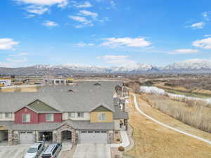 Aerial view featuring a residential view and a mountain view