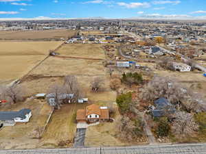 Drone / aerial view featuring a residential view and a mountain view