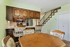 Dining space with stairs