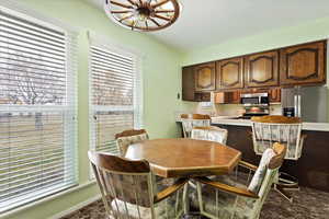 Dining space featuring baseboards