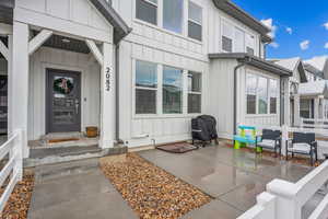 Entrance to property featuring board and batten siding