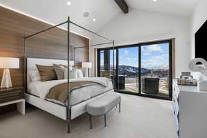 Bedroom featuring access to outside, light colored carpet, beamed ceiling, and wood walls