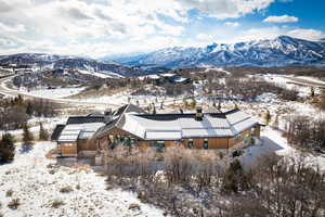 Snowy aerial view with a mountain view