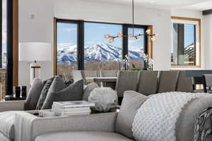 Interior space featuring a healthy amount of sunlight and a mountain view