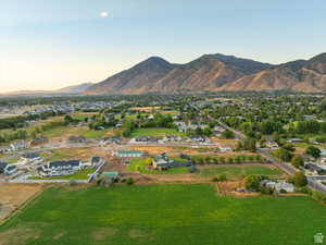 Birds eye view of property featuring a residential view and a mountain view