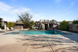 View of swimming pool featuring a patio