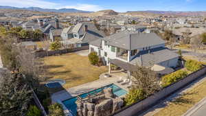 Birds eye view of property with a mountain view