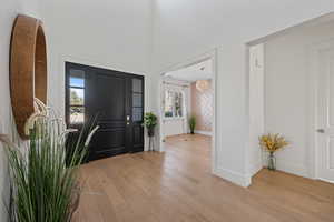 Foyer with light wood-type flooring