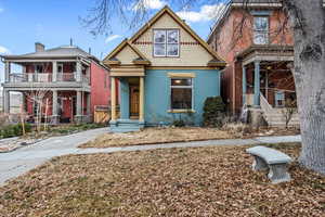 View of front of home featuring a balcony