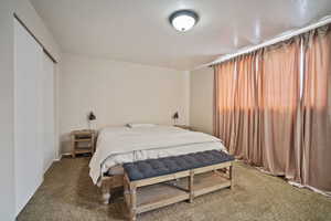 Bedroom featuring carpet flooring