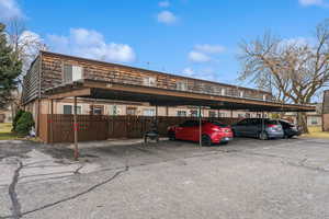 Covered parking lot with fence