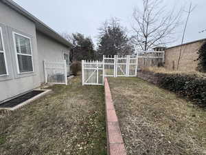 View of yard with fence