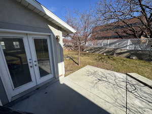 View of patio featuring french doors