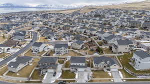 Drone / aerial view featuring a residential view and a mountain view