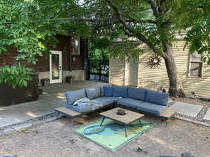 View of patio featuring an outdoor hangout area