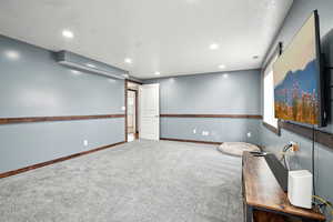 Interior space featuring baseboards and recessed lighting