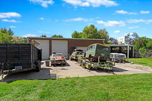 Garage featuring a detached garage