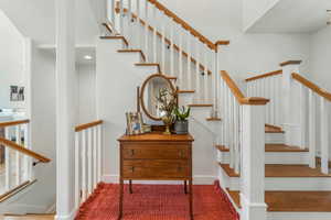 Stairs featuring baseboards