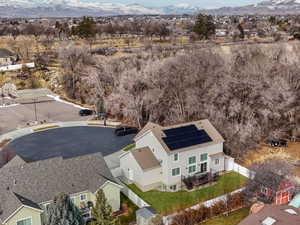 Birds eye view of property featuring a residential view and a mountain view