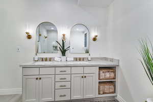 Bathroom with a shower and vanity