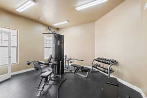 Workout area featuring a healthy amount of sunlight