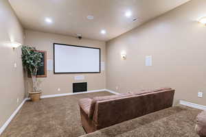 Home theater room with carpet