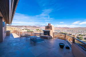 View of patio / terrace with a mountain view