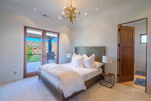 Bedroom featuring recessed lighting, light colored carpet, visible vents, access to exterior, and french doors