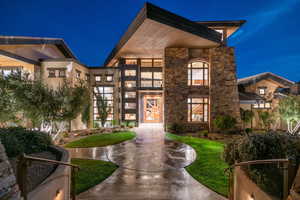 View of front of property featuring stone siding