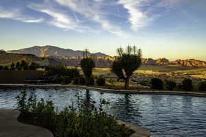 Community pool featuring a patio area and a mountain view