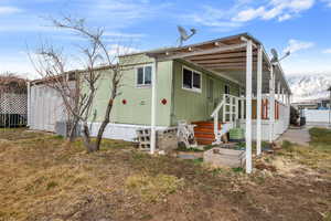 View of front of property with a mountain view