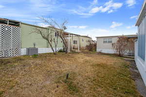 View of yard featuring cooling unit