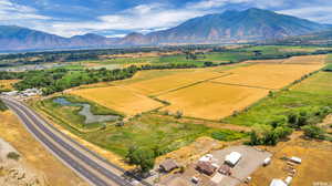 Bird's eye view featuring a rural view and a mountain view